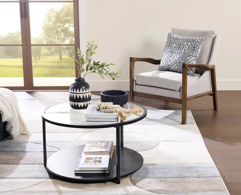 Table basse moderne ronde Kendal de 31,5 po avec plateau en verre et roulettes