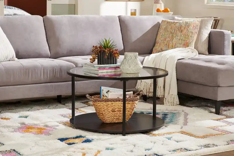 Table basse moderne ronde Kendal de 31,5 po avec plateau en verre et roulettes