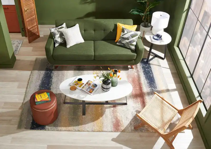 Table d'appoint ovale moderne Nico 56 cm Kort & Co. – Plateau en pierre frittée blanche, pieds en métal gris foncé, résistant aux rayures et aux taches