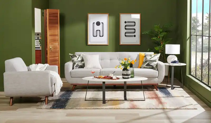 Table d'appoint ovale moderne Nico 56 cm Kort & Co. – Plateau en pierre frittée blanche, pieds en métal gris foncé, résistant aux rayures et aux taches